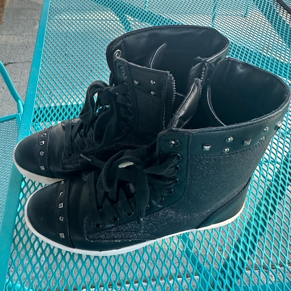 Hip hop sparkly boots with studded details in black.  Size 6